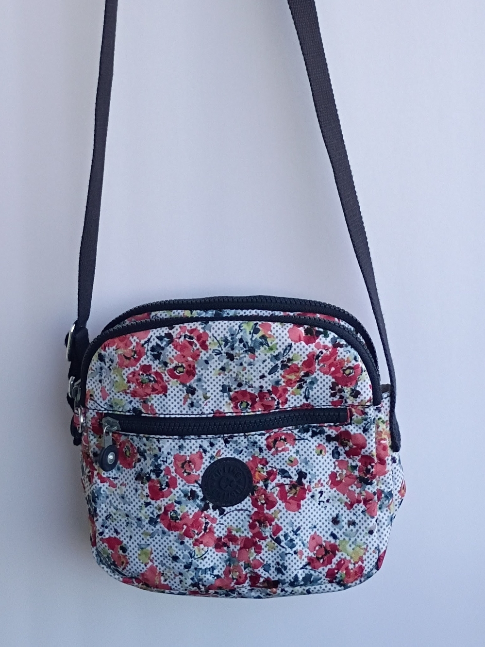 Kipling Keefe Crossbody Bag in the "Busy Blossoms" floral print.
